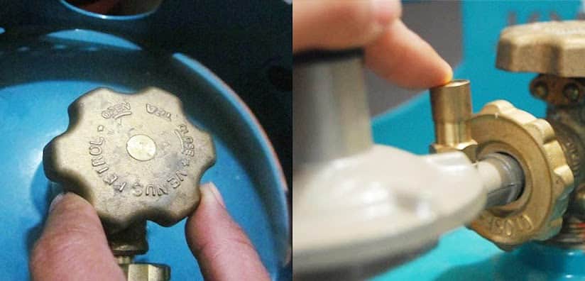 Nhấn chốt an toàn của bình gas